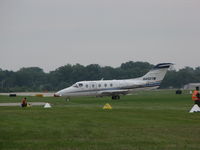 N452TM @ KOSH - landing at Oshkosh - by steveowen