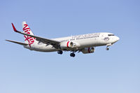 VH-YIU @ YSSY - Virgin Australia (VH-YIU) Boeing 737-8FE(WL) on approach to runway 25 at Sydney Airport. - by YSWG-photography