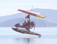 N269D - Taking off on Clear Lake, CA - by Bill Larkins