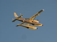 N208RB @ KOSH - Fine C-208 heading into the setting sun - by steveowen