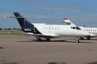 N666JC @ KTPA - This British Aerospace BAE-125 800A sits in afternoon sun at the general aviation ramp at Tampa Int'l Airport - by Ron Coates