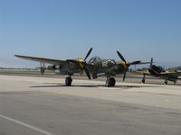 N138AM @ CMA - 1943 P-38J LIGHTNING '23 SKIDOO', two Allison V-1710-89/91 counter-rotating 1,425 Hp each, also known as 'Louise', of Planes of Fame, taxi - by Doug Robertson