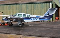 G-OPAT @ EGHH - Receiving attention at DS Worldwide - by John Coates