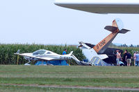 D-EOSM @ EDMT - Udet U.12a Flamingo (replica) [1785] (Flugwerft Schleissheim) Tannheim~D 24/08/2013. Aircraft in cornfield people gathering round. Pilot and co pilot escaped unhurt 3 people injured on the ground 1 seriously who was taken by Air Ambulance to hospital. - by Ray Barber