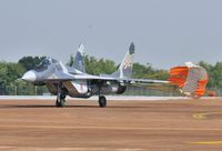 111 @ EGVA - About to shed its chute after practise for RIAT 2013 - by John Coates