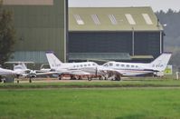 G-VVIP @ EGHH - With sister UVIP at CTC. - by John Coates