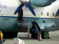 UR-CBG @ LOWG - AeroVis Antonov An-12 crew boarding - by Paul H