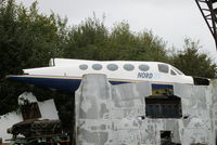 EC-JCC @ EGTB - now in bits inside the Parkhouse Aviation yard at Booker - by Chris Hall