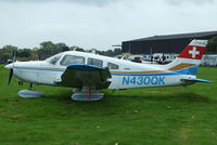 N430QK @ EGTR - parked with the other wrecks & relics at Elstree - by Chris Hall