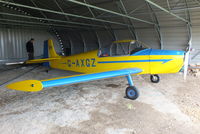 G-AXGZ @ EGTN - in a new hangar at Enstone Airfield - by Chris Hall