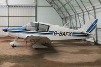 G-BAFX @ EGTN - inside the Enstone Flying Clubs new hangar - by Chris Hall