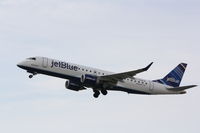 N328JB @ KSRQ - JetBlue Flight 940 (N328JB) Blue Warrior departs Sarasota-Bradenton International Airport enroute to Boston-Logan International Airport - by Donten Photography