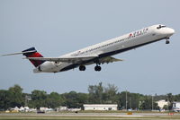 N928DN @ KSRQ - Delta Flight 2298 (N928DN) departs Sarasota-Bradenton International Airport enroute to Hartsfield-Jackson Atlanta International Airport - by Donten Photography