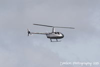 N779HA @ KSRQ - Robinson R-66 (N779HA) departs Sarasota-Bradenton International Airport - by Donten Photography