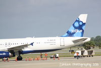N665JB @ KSRQ - JetBlue Flight 164 (N665JB) Something About Blue prepares for flight at Sarasota-Bradenton International Airport - by Donten Photography