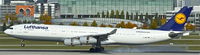 D-AIFC @ EDDM - Lufthansa, very smoky touchdown on RWY 26L at München(EDDM) - by A. Gendorf