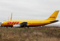 EI-OZH @ LFBT - Stored in new DHL c/s... - by Shunn311