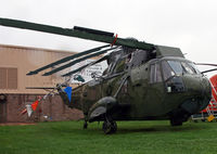 151556 @ KOQN - A very soggy Sea King waits out the foul weather at the American Helicopter Museum. - by Daniel L. Berek