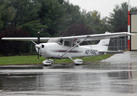 N2746C @ KOQN - A shiny new Skyhawk braves a downpour at Brandywine Airport. - by Daniel L. Berek