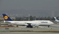D-ABYI @ KLAX - Taxiing to gate at LAX - by Todd Royer