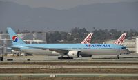 HL8217 @ KLAX - Taxiing to parking at LAX - by Todd Royer