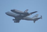 OV-105 @ MCO - Space Shuttle Endeavor riding on the back of the 747 over Orlando International Airport