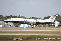 N728PH @ KSRQ - Embraer 135 (N728PH) arrives at Sarasota-Bradenton International Airport following a flight from Westchester County Airport - by Donten Photography