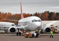 EI-ETT @ EGHH - Being parked up at European Aviation. - by John Coates