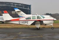 G-HOPE @ EGHH - Taxiing with a cheery wave. - by John Coates