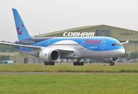 G-TUIA @ EGHH - Taxiing to stand - by John Coates