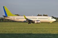 G-GDFN @ EGHH - Still in basic Air Baltic colours arriving for repaint to Jet 2 Holidays - by John Coates