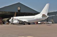 VP-BXN @ EGHH - Just painted all white at European Aviation - by John Coates