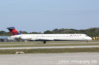 N987DL @ KSRQ - Delta Flight 2460 (N987DL) arrives at Sarasota-Bradenton International Airport following a flight from Hartsfield-Jackson Atlanta International Airport - by Donten Photography