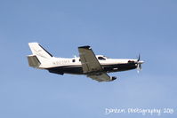 N903MA @ KSRQ - Socata TBM-700 (N903MA) departs Sarasota-Bradenton International Airport - by Donten Photography