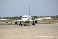 N594JB @ KSRQ - JetBlue Flight 164 (N594JB) Whole Lotta Blue prepares for flight at Sarasota-Bradenton International Airport - by Donten Photography
