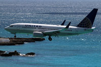 N16701 @ SXM - At famous Maho Beach - by Wolfgang Zilske