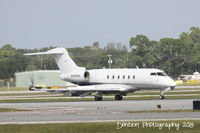 N414DH @ KSRQ - Bombardier Challenger 300 (N414DH) - by Donten Photography