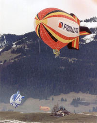 LX-PST - LX-PST flying in Chateau D'Oex, Switzerland, circa early 1990's. - by usahotair