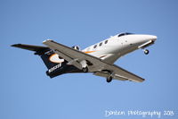 N353SB @ KSRQ - Embraer Phenom 100 (N353SB) on approach to Sarasota-Bradenton International Airport - by Donten Photography