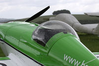 G-RIHN @ EGHA - Privately owned, at the aerobatic competition here. Close up of the rain on the canopy. - by Howard J Curtis