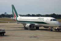 EI-RDO @ LIML - Alitalia Cityliner. - by Howard J Curtis
