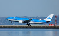 PH-AOF @ SFO - Landing at San Francisco - by Bill Larkins