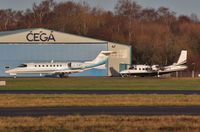 G-XJET @ EGHH - Home at Cega with visiting RC690 M-BETS - by John Coates