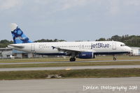 N665JB @ KSRQ - JetBlue Flight 163 (N665JB) Something About Blue arrives at Sarasota-Bradenton International Airport following a flight from John F Kennedy International Airport - by Donten Photography