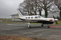 N921GG @ EGHH - Waiting to visit paintshop - by John Coates