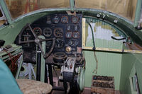 VH-WAC @ N.A. - The partly restored cockpit of Avro Anson VH-WAC The Islander, which used to fly with Woods Airways between Perth and Rottnest Island in Western Australia, 1948-1961. Now preserved in the RAAFA Aviation Heritage Museum in Bull Creek near Perth. - by Henk van Capelle