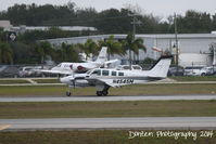 N4545M @ KSRQ - Beechcraft Baron (N4545M) arrives at Sarasota-Bradenton International Airport following a flight from Orlando-Sanford International Airport - by Donten Photography