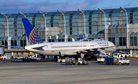 N556UA @ KORD - Gate B9  ORD - by Ronald Barker