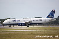 N592JB @ KSRQ - JetBlue Flight 163 (N592JB) American Blue arrives at Sarasota-Bradenton International Airport following a flight from John F Kennedy International Airport - by Donten Photography