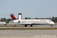 N989DL @ KSRQ - Delta Flight 2298 (N989DL) taxis at Sarasota-Bradenton International Airport - by Donten Photography